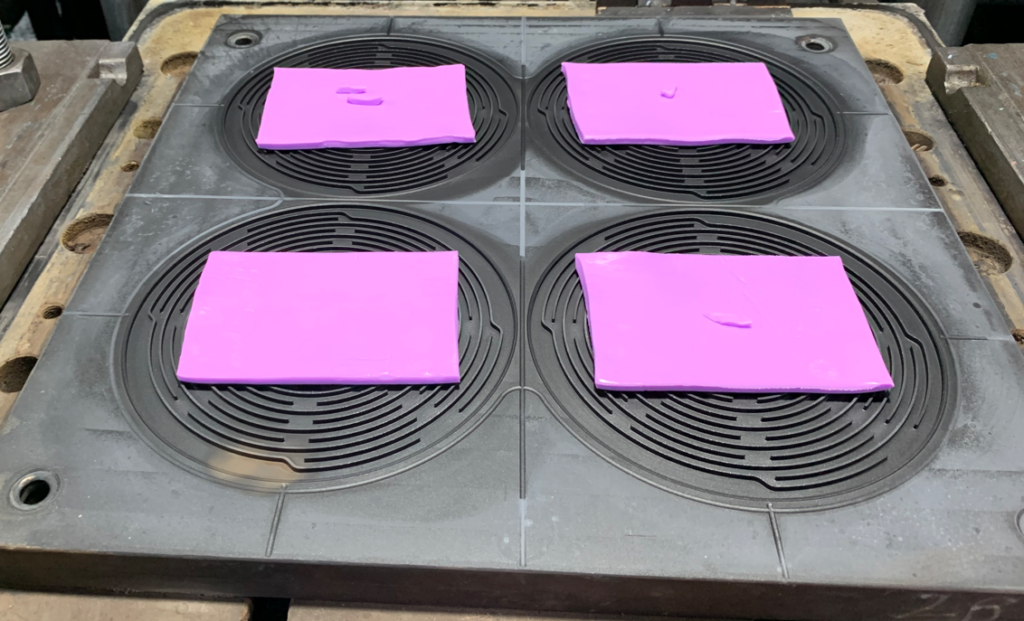 compression molding feeding material